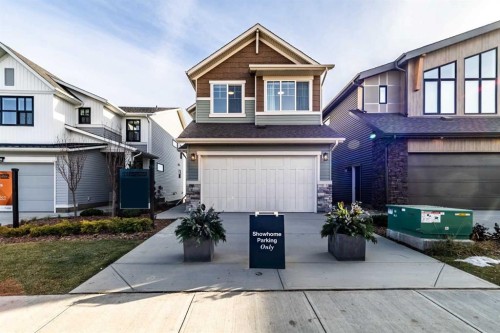 203 Lucas Common Nw, Calgary, AB - Outdoor With Facade