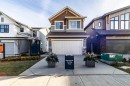 203 Lucas Common Nw, Calgary, AB  - Outdoor With Facade 