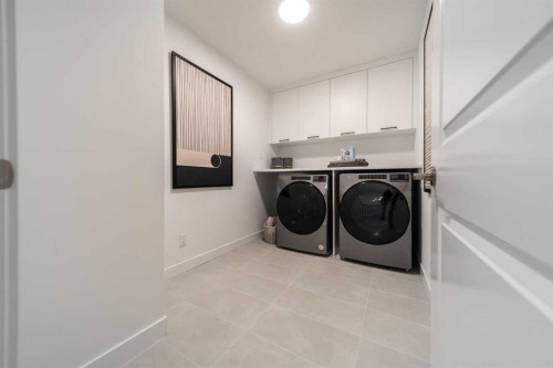 203 Lucas Common Nw, Calgary, AB - Indoor Photo Showing Laundry Room