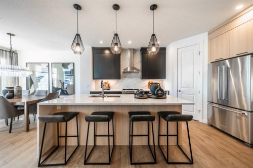 203 Lucas Common Nw, Calgary, AB - Indoor Photo Showing Kitchen With Double Sink With Upgraded Kitchen