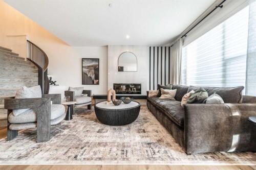 203 Lucas Common Nw, Calgary, AB - Indoor Photo Showing Living Room With Fireplace