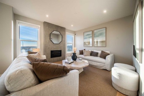 207 Lucas Common Nw, Calgary, AB - Indoor Photo Showing Living Room With Fireplace