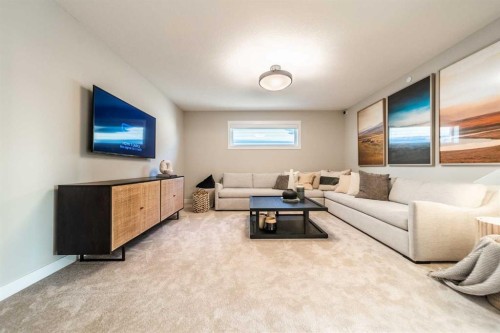 207 Lucas Common Nw, Calgary, AB - Indoor Photo Showing Living Room