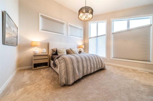 207 Lucas Common Nw, Calgary, AB - Indoor Photo Showing Bedroom
