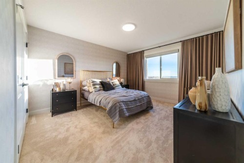 207 Lucas Common Nw, Calgary, AB - Indoor Photo Showing Bedroom