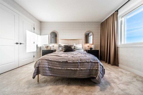 207 Lucas Common Nw, Calgary, AB - Indoor Photo Showing Bedroom