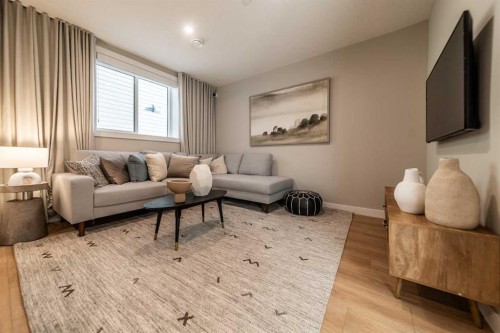 207 Lucas Common Nw, Calgary, AB - Indoor Photo Showing Living Room