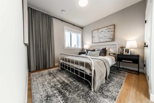 207 Lucas Common Nw, Calgary, AB - Indoor Photo Showing Bedroom
