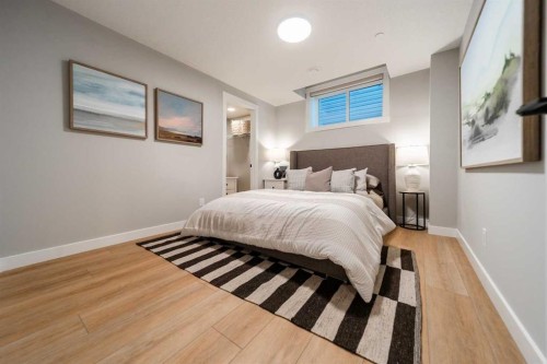 207 Lucas Common Nw, Calgary, AB - Indoor Photo Showing Bedroom