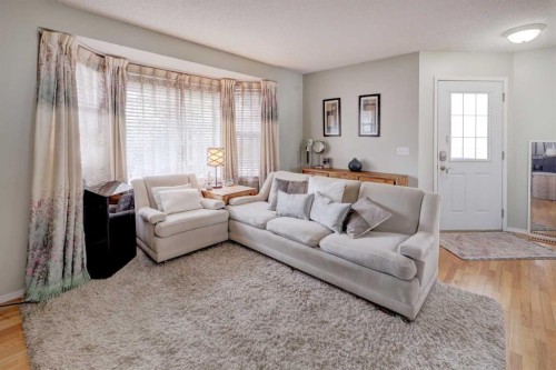 134 Hidden Way Nw, Calgary, AB - Indoor Photo Showing Living Room