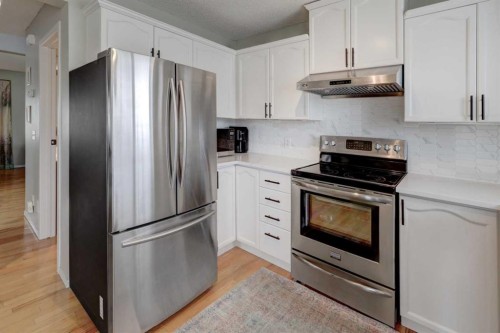 134 Hidden Way Nw, Calgary, AB - Indoor Photo Showing Kitchen With Stainless Steel Kitchen