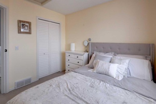 134 Hidden Way Nw, Calgary, AB - Indoor Photo Showing Bedroom