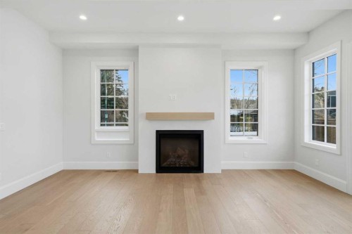 703 35 Street Nw, Calgary, AB - Indoor With Fireplace