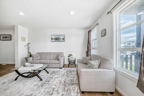 197 Belmont Drive Sw, Calgary, AB - Indoor Photo Showing Living Room