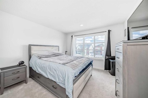197 Belmont Drive Sw, Calgary, AB - Indoor Photo Showing Bedroom