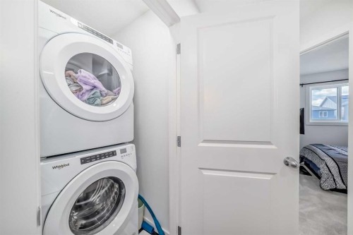197 Belmont Drive Sw, Calgary, AB - Indoor Photo Showing Laundry Room