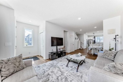 197 Belmont Drive Sw, Calgary, AB - Indoor Photo Showing Living Room