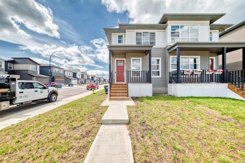 197 Belmont Drive Sw, Calgary, AB - Outdoor With Deck Patio Veranda With Facade