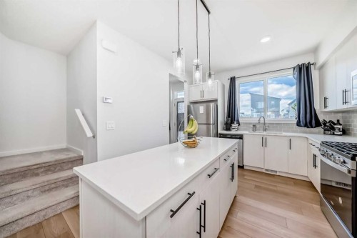 197 Belmont Drive Sw, Calgary, AB - Indoor Photo Showing Kitchen With Upgraded Kitchen