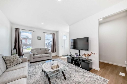 197 Belmont Drive Sw, Calgary, AB - Indoor Photo Showing Living Room