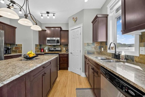 12 Vermont Close, Olds, AB - Indoor Photo Showing Kitchen With Stainless Steel Kitchen With Double Sink
