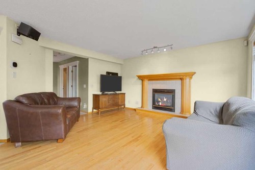 175 Panorama Hills Close Nw, Calgary, AB - Indoor Photo Showing Living Room With Fireplace