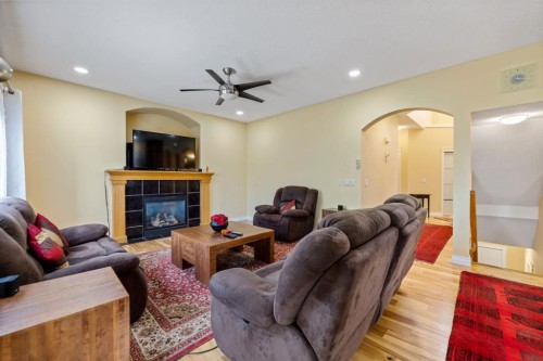 115 Kincora View Nw, Calgary, AB - Indoor Photo Showing Living Room With Fireplace