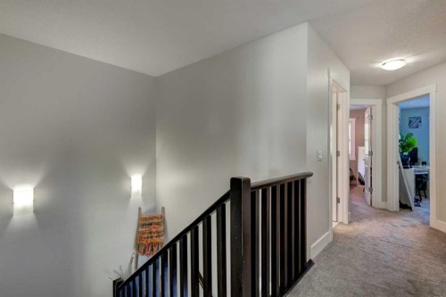 152 Mike Ralph Way Sw, Calgary, AB - Indoor Photo Showing Other Room