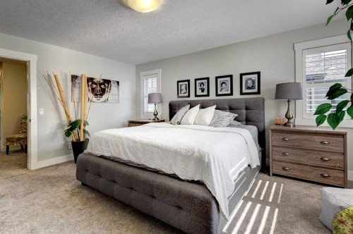 152 Mike Ralph Way Sw, Calgary, AB - Indoor Photo Showing Bedroom