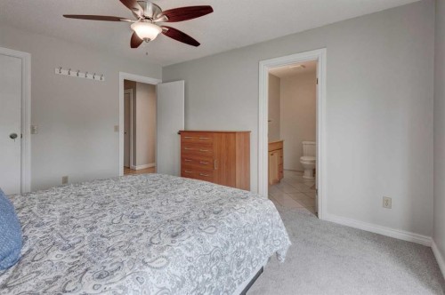 405 2 Avenue Nw, Diamond Valley, AB - Indoor Photo Showing Bedroom