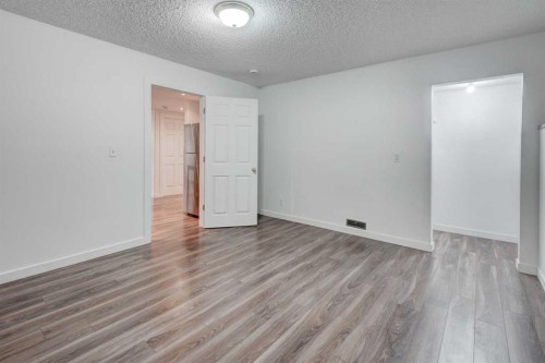 405 2 Avenue Nw, Diamond Valley, AB - Indoor Photo Showing Other Room