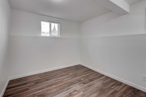 405 2 Avenue Nw, Diamond Valley, AB - Indoor Photo Showing Other Room