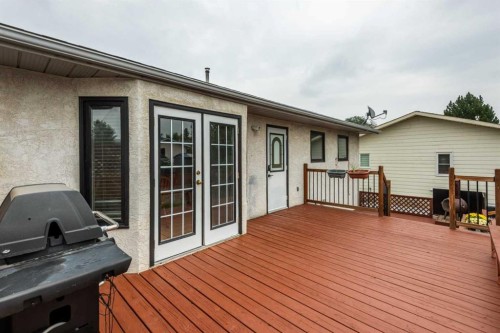 405 2 Avenue Nw, Diamond Valley, AB - Outdoor With Deck Patio Veranda With Exterior