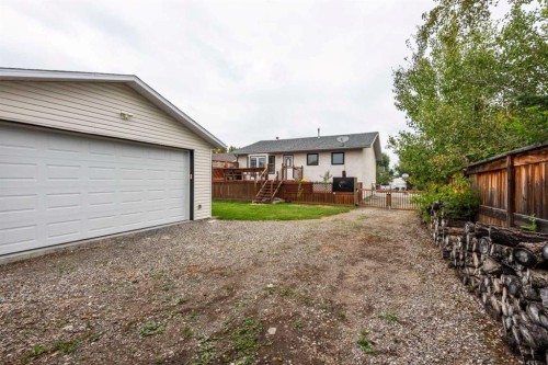 405 2 Avenue Nw, Diamond Valley, AB - Outdoor With Deck Patio Veranda With Exterior