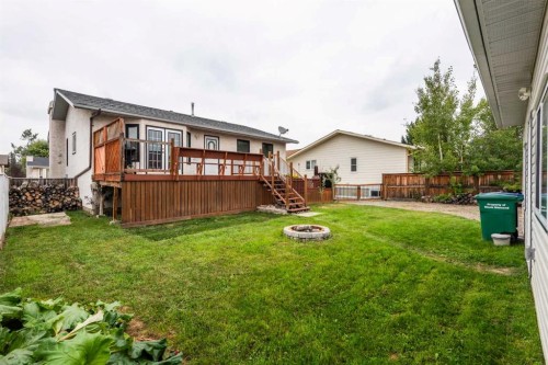405 2 Avenue Nw, Diamond Valley, AB - Outdoor With Deck Patio Veranda With Exterior