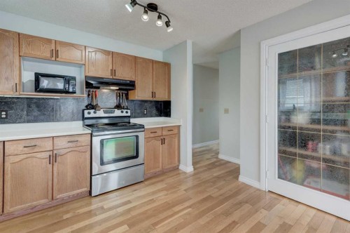 405 2 Avenue Nw, Diamond Valley, AB - Indoor Photo Showing Kitchen