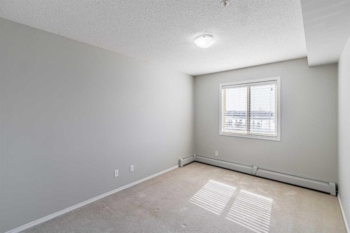 316-5 Saddlestone Way Ne, Calgary, AB - Indoor Photo Showing Other Room