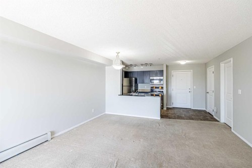 316-5 Saddlestone Way Ne, Calgary, AB - Indoor Photo Showing Other Room
