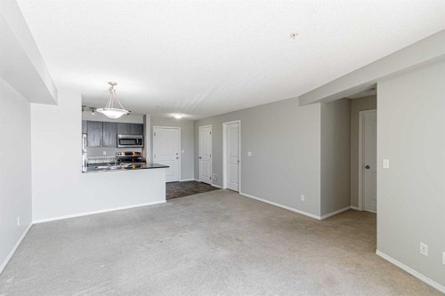 316-5 Saddlestone Way Ne, Calgary, AB - Indoor Photo Showing Other Room