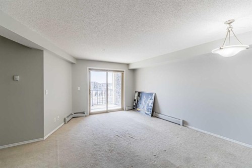 316-5 Saddlestone Way Ne, Calgary, AB - Indoor Photo Showing Other Room