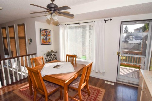 14954 Mt Mckenzie Drive Se, Calgary, AB - Indoor Photo Showing Dining Room