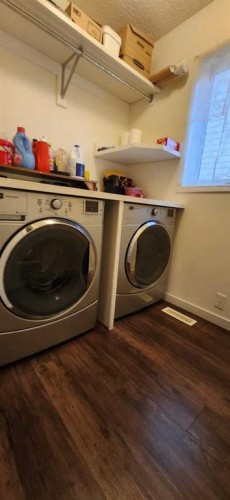 14954 Mt Mckenzie Drive Se, Calgary, AB - Indoor Photo Showing Laundry Room