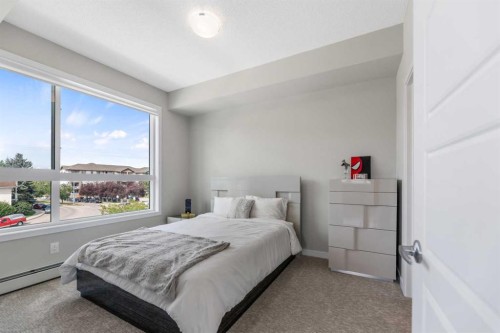 302-1605 17 Street Se, Calgary, AB - Indoor Photo Showing Bedroom