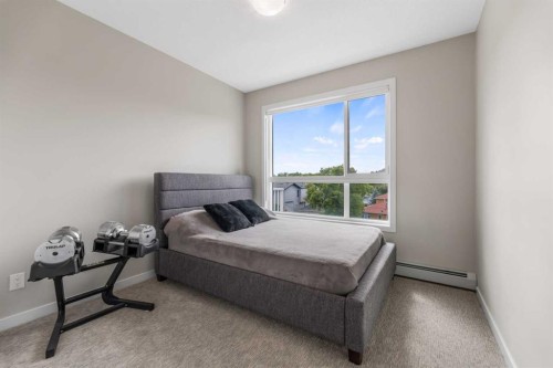 302-1605 17 Street Se, Calgary, AB - Indoor Photo Showing Bedroom