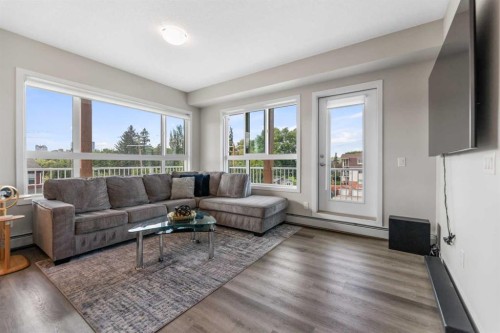 302-1605 17 Street Se, Calgary, AB - Indoor Photo Showing Living Room
