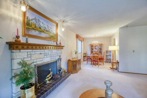 307 Silverthorn Way Nw, Calgary, AB - Indoor With Fireplace