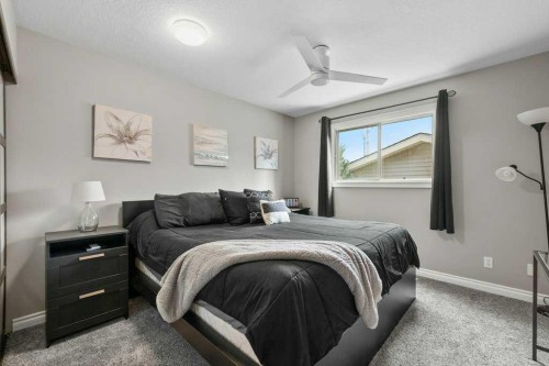 55 Macewan Drive Nw, Calgary, AB - Indoor Photo Showing Bedroom
