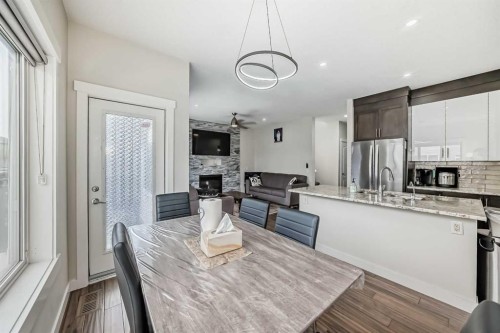 9 Saddlecrest Crescent Ne, Calgary, AB - Indoor Photo Showing Kitchen With Fireplace With Upgraded Kitchen
