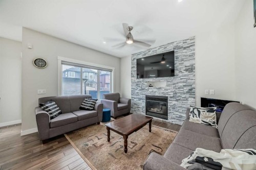 9 Saddlecrest Crescent Ne, Calgary, AB - Indoor Photo Showing Living Room With Fireplace