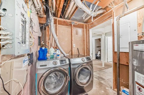 9 Saddlecrest Crescent Ne, Calgary, AB - Indoor Photo Showing Laundry Room